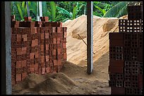 Bricks and rice hulk. Mekong Delta, Vietnam (color)