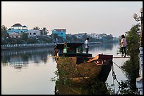 Couple on barge, Long Binh River. Tra Vinh, Vietnam (color)