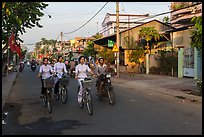 Schoolgirls on bicycles. Tra Vinh, Vietnam (color)