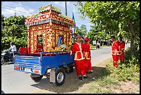 Funeral vehicle and attendants. Tra Vinh, Vietnam ( color)