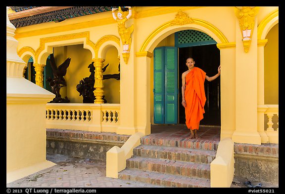 Monk standing in front of Ang Pagoda. Tra Vinh, Vietnam (color)
