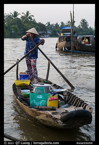 Picture/Photo: Woman paddles boat with pho noodles, Phung Diem. Can Tho ...