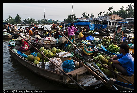 Boats closely decked together, Phung Diem floating market. Can Tho, Vietnam (color)