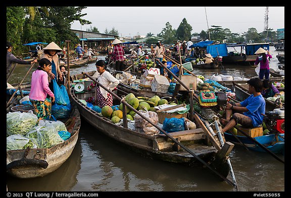 Produce transaction on Phung Diem floating market. Can Tho, Vietnam