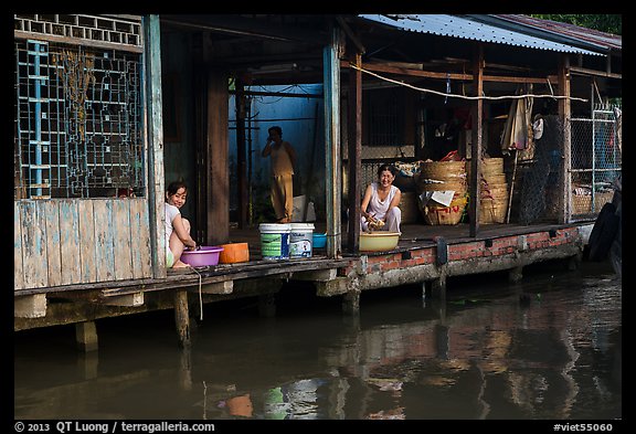 Riverside food preparation. Can Tho, Vietnam (color)