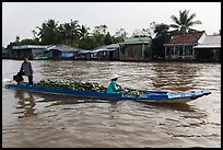 Long boat loaded with watermelon. Can Tho, Vietnam (color)