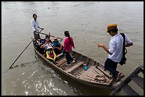 Schoolchildren stepping onto boat. Can Tho, Vietnam ( color)