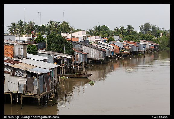 Riverside houses on stilts. Mekong Delta, Vietnam (color)