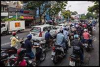 Dense motorcycle traffic. Ho Chi Minh City, Vietnam ( color)