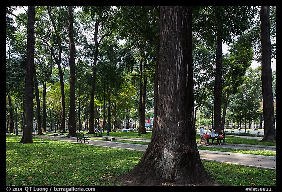 Vendor and couple, 30-4 Park. Ho Chi Minh City, Vietnam