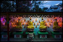Buddha images at dusk, Viet Nam Quoc Tu pagoda. Ho Chi Minh City, Vietnam ( color)