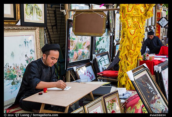 Caligraphers at lunar new year market. Ho Chi Minh City, Vietnam (color)