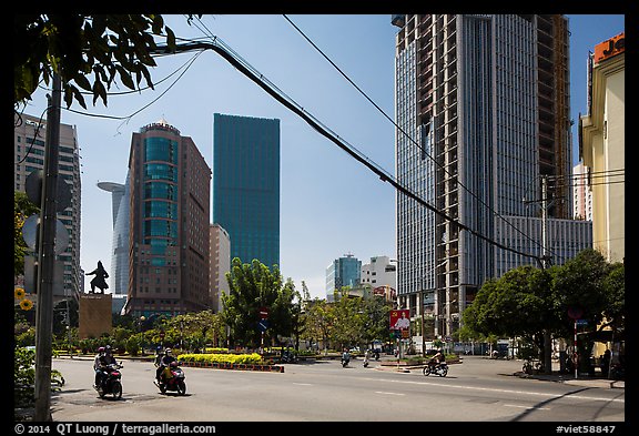 Statue of hero Tran Hung Dao and high-rises. Ho Chi Minh City, Vietnam (color)