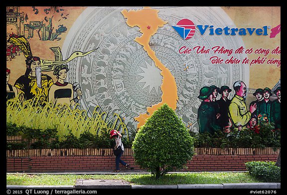 Lottery ticket child seller walking on sidewalk. Ho Chi Minh City, Vietnam (color)