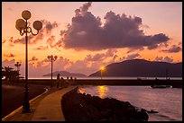 Lamps and Con Son seafront before sunrise. Con Dao Islands, Vietnam ( color)