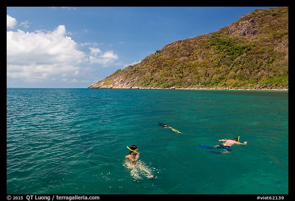 Snorklers near Bay Canh Island, Con Dao National Park. Con Dao Islands, Vietnam (color)