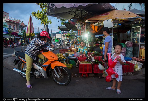 Con Dao market scene at dusk, Con Son. Con Dao Islands, Vietnam (color)