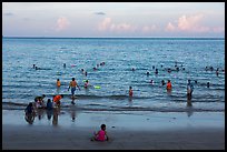 Beachgoers at sunset, Con Son. Con Dao Islands, Vietnam ( color)