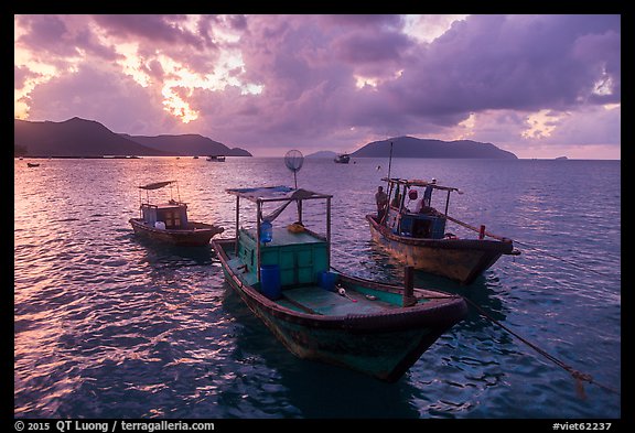Fishing boats at sunrise, Con Son harbor. Con Dao Islands, Vietnam (color)
