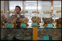 Eddible birds nest and vendor. Con Dao Islands, Vietnam ( color)