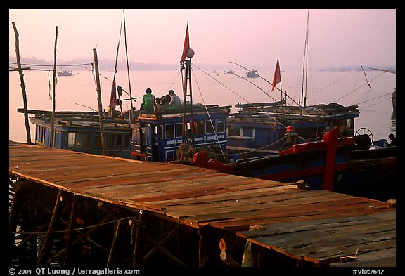Pier and fishing boats, Nhat Le River, Dong Hoi. Vietnam (color)