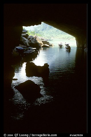 Interior and entrance of Phong Nha Cave with Rocks and boats. Vietnam (color)