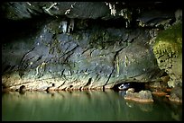 Tour boat getting out of a tunnel, Phong Nha Cave. Vietnam