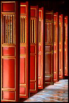 Red doors of the temple inside the Minh Mang Mausoleum. Hue, Vietnam
