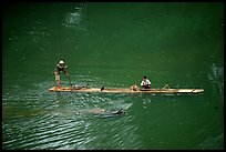 Crossing the Ky Cung  River on a narrow dugout boat. Northest Vietnam ( color)