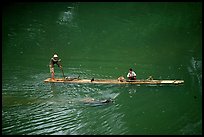 Crossing the Ky Cung  River on a narrow dugout boat. Northest Vietnam ( color)
