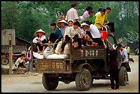 Riding in the back of an overloaded truck. Northest Vietnam