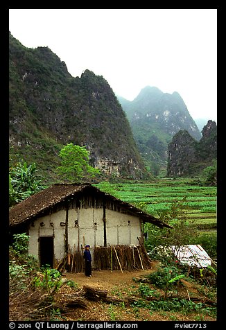 Rural home, terraced cultures, and karstic peaks, Ma Phuoc Pass area. Northeast Vietnam