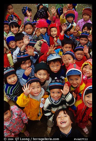 Schoolchildren dressed for the cool mountain weather. Northeast Vietnam (color)