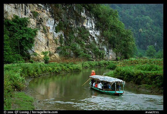 Shallow boats transport villagers to a market. Northeast Vietnam