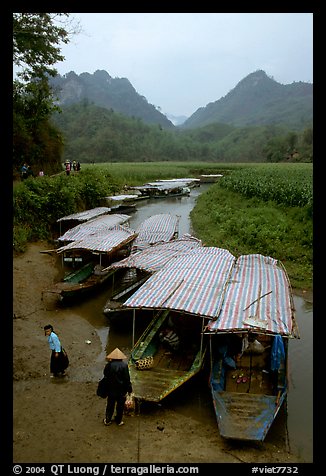 Boats waiting for villagers at a market. Northeast Vietnam (color)