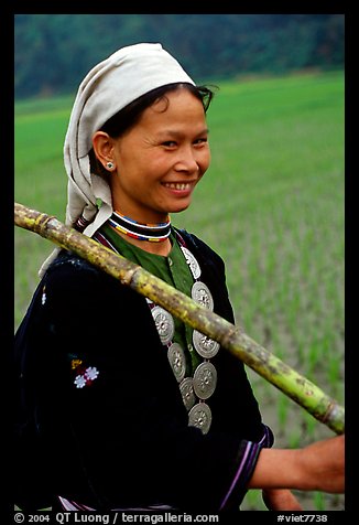 Hilltribeswoman with traditional necklace, Ba Be Lake. Vietnam (color)