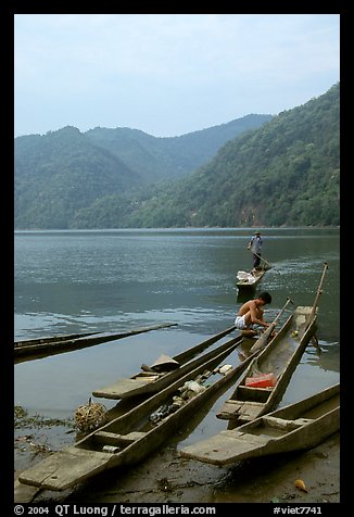 Typical dugout boats on the shore of Ba Be Lake. Northeast Vietnam