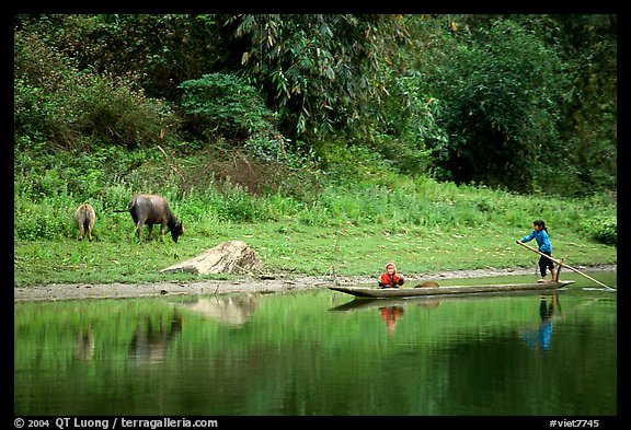 Children on a dugout boat. Northeast Vietnam (color)