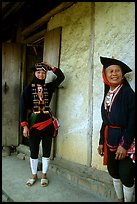 Two generations of tribewomen outside their house, near Mai Chau. Northwest Vietnam (color)