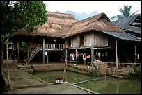 Stilt houses with thatched roofs of Ban Lac village. Northwest Vietnam