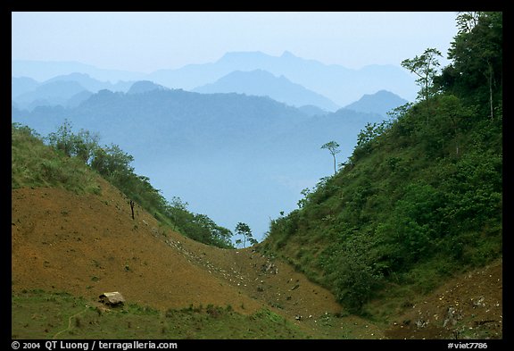 House and misty ridges between Moc Chau and Yeu Chau. Northwest Vietnam (color)