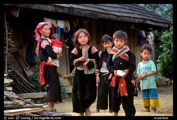 Hmong family in front of their home, near Tam Duong. Northwest Vietnam