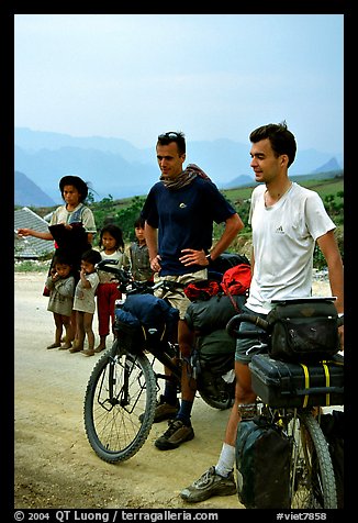 Western adventure travellers on mountain bikes, near Tam Duong. Northwest Vietnam