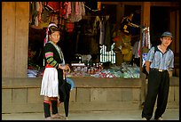 Man and montagnard woman in front of a store, near Lai Chau. Northwest Vietnam