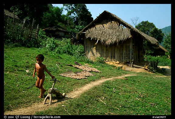 Unclothed child in a minority village, between Lai Chau and Tam Duong. Northwest Vietnam (color)