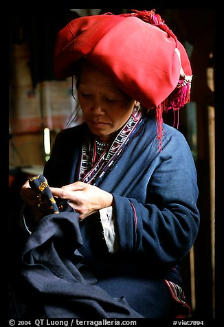 Red Dzao women sewing. Vietnam