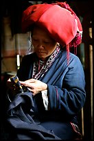 Red Dzao women sewing. Vietnam (color)