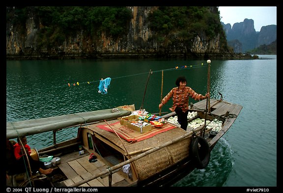 Peddling from a boat. Halong Bay, Vietnam