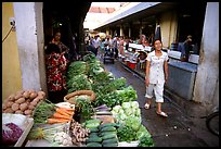 Vegetables for sale in an alley of the Ben Than Market. Ho Chi Minh City , Vietnam ( color)