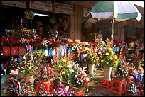 Flowers for sale outside the Ben Than Market. Ho Chi Minh City , Vietnam ( color)